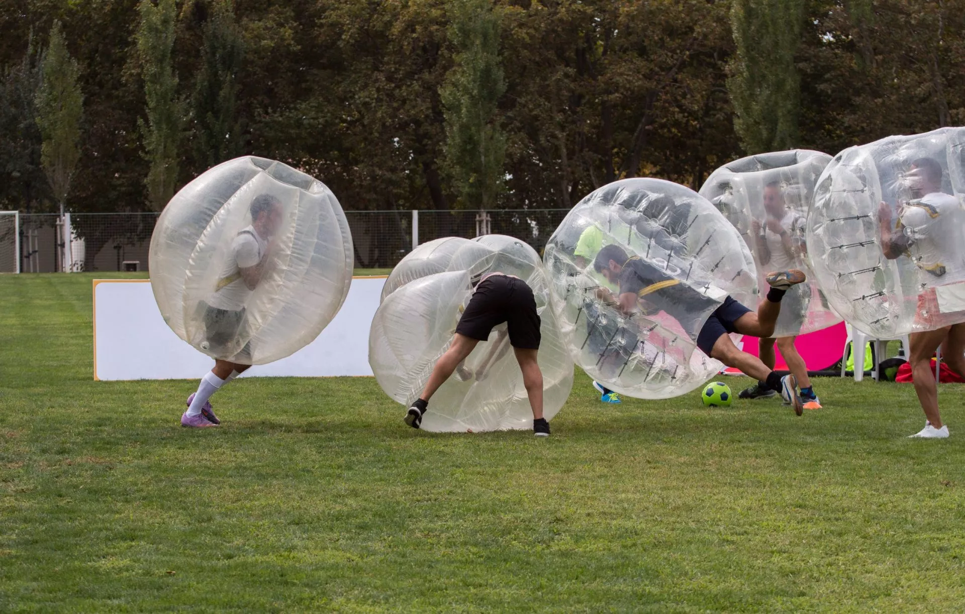Group playing bubble football